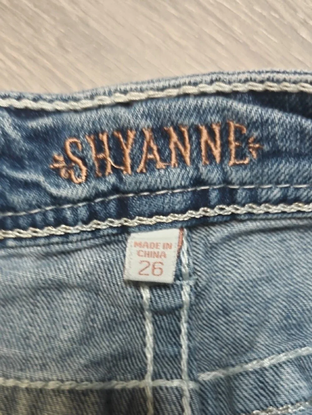 Light Wash Denim Short Shorts with Embellished Pockets